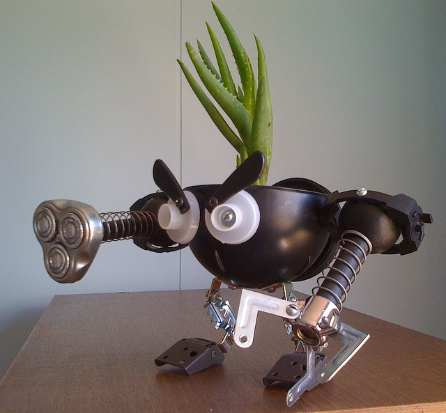 recycled robo planter people
