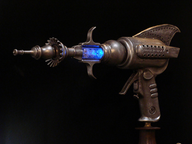 Steampunk Revolver Raygun with lights, full metal body plus wooden grip.  Made this from an older model. Which one do you like better? :  r/sciencefiction