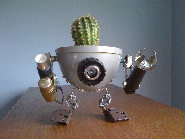 recycled robo planter people