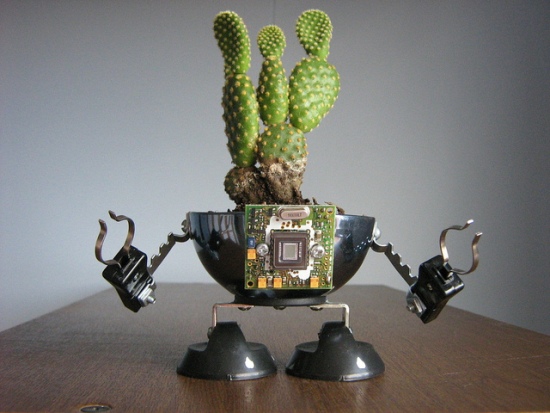 recycled robo planter people