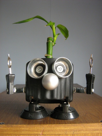 recycled robo planter people