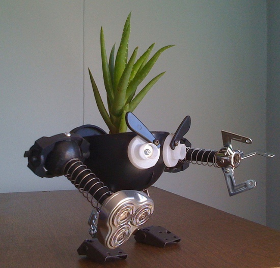 recycled robo planter people