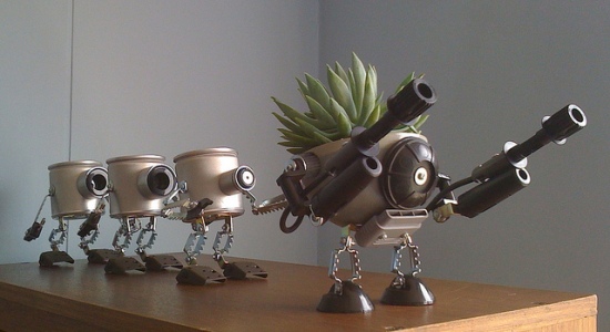 recycled robo planter people
